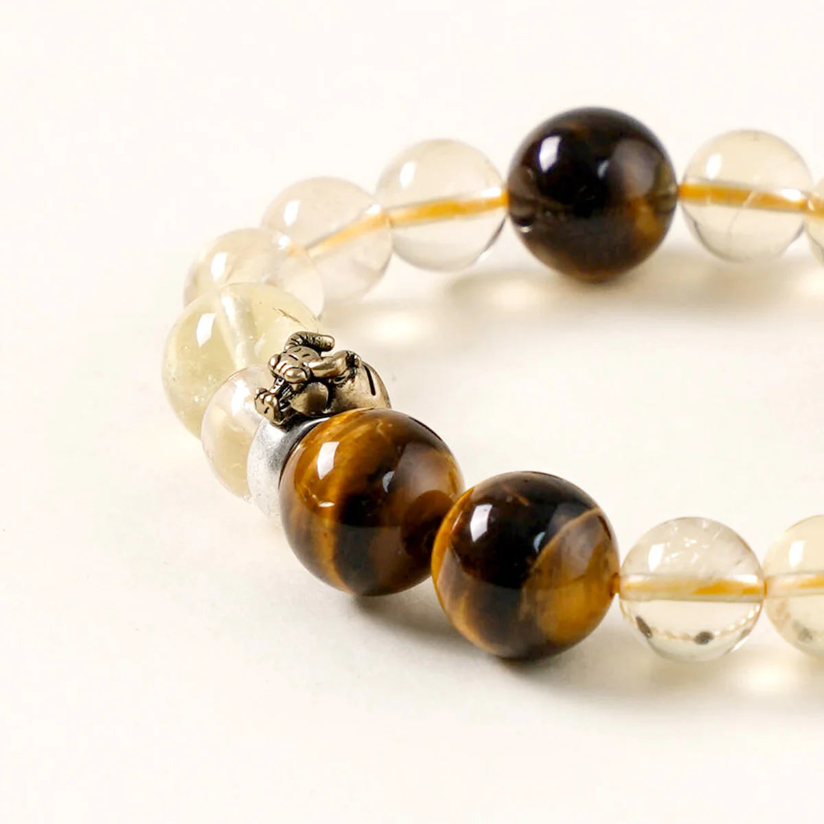 牛座星座守護手鍊 – 虎眼石和金紅石石英，具有接地氣的功效